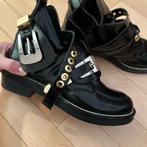 Balenciaga Black Patent Leather Combat Boots with Gold Accents